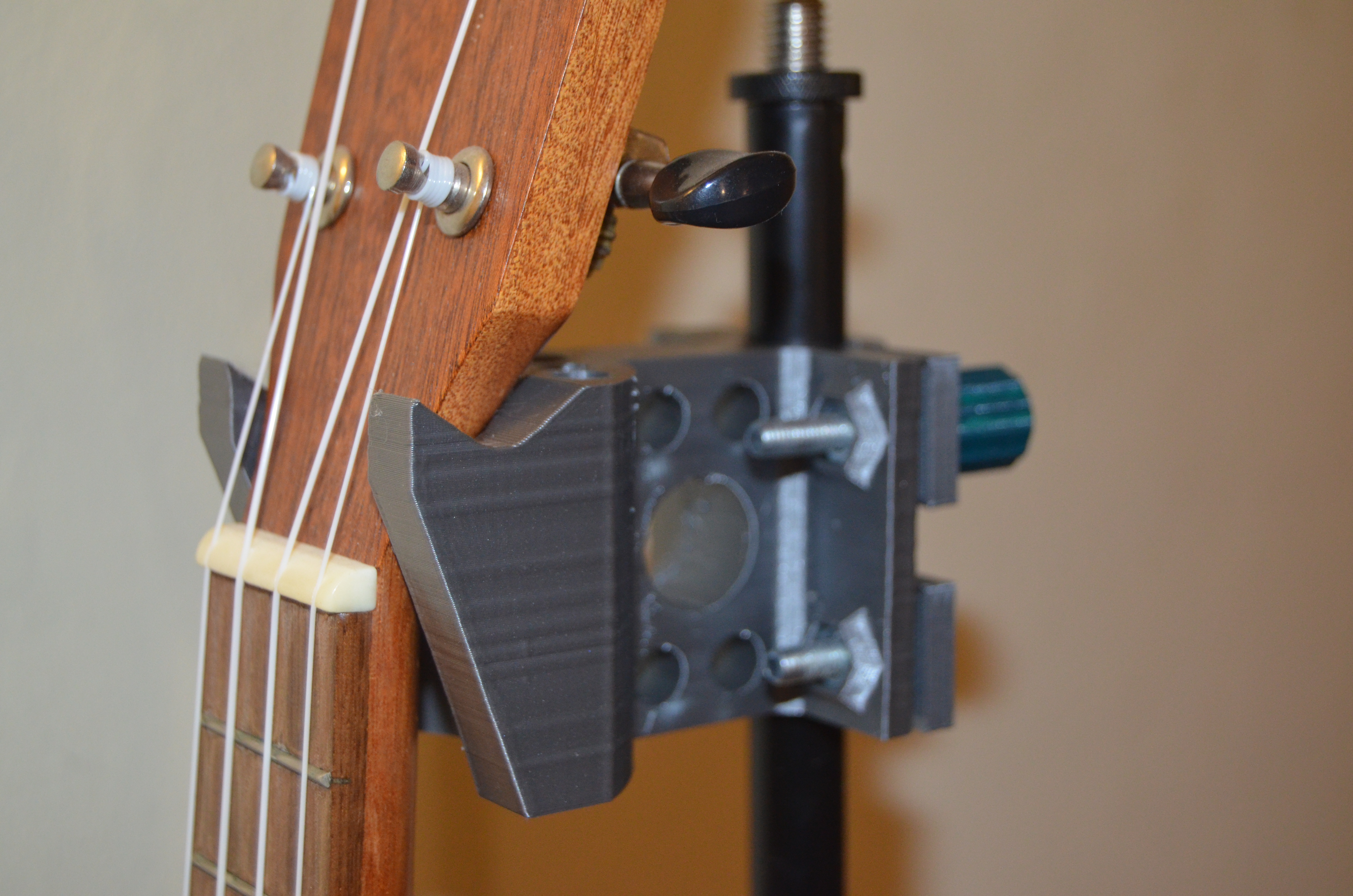 Ukelele holder for a mic stand