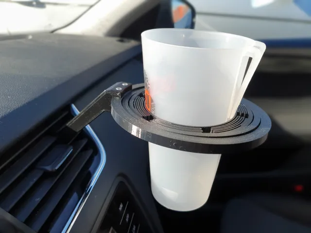 🚗🥤 Samonivelirajući držač čaše za montažu na automobil.