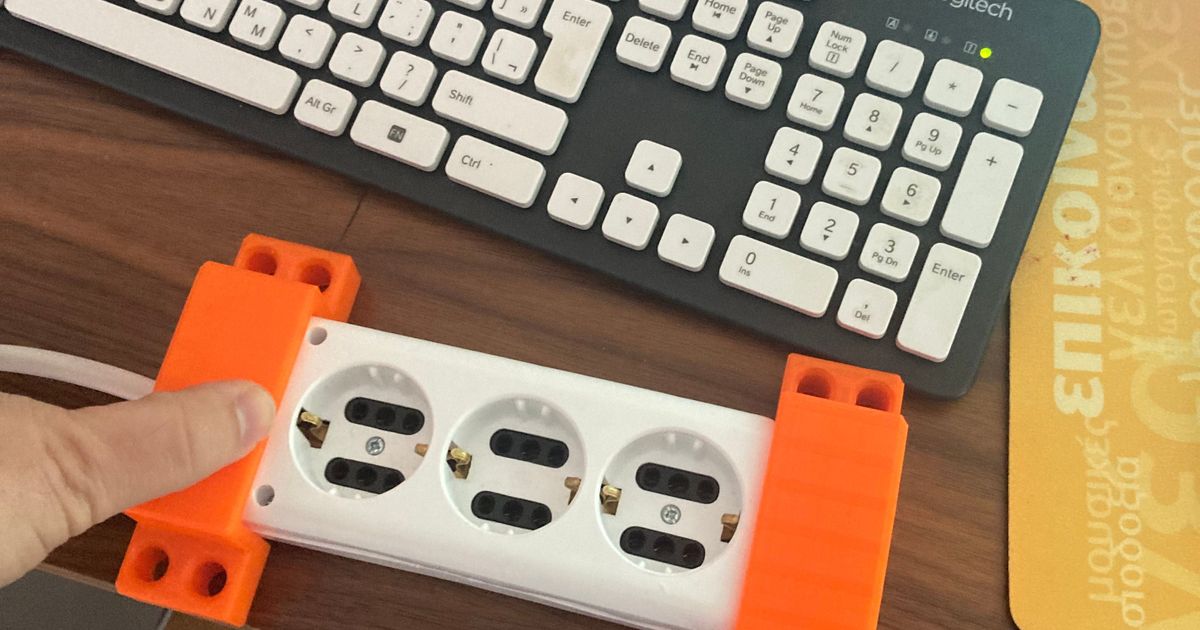 Power strip wall holder by dkaparelis Download free STL model