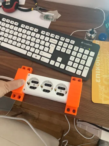 Power strip wall holder