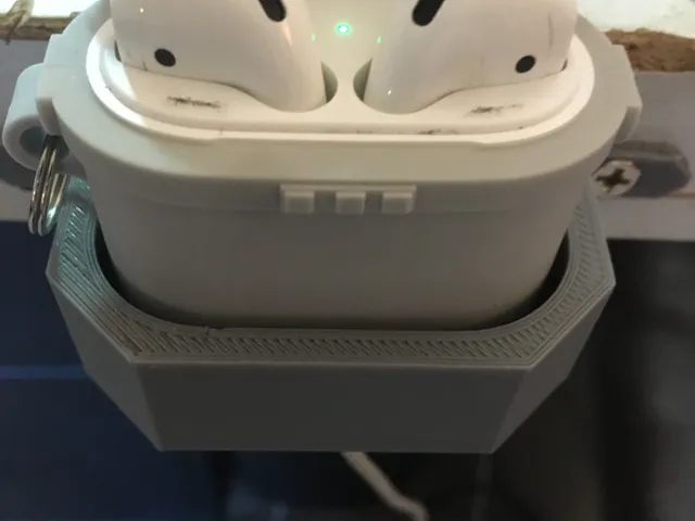 AirPods with case holder