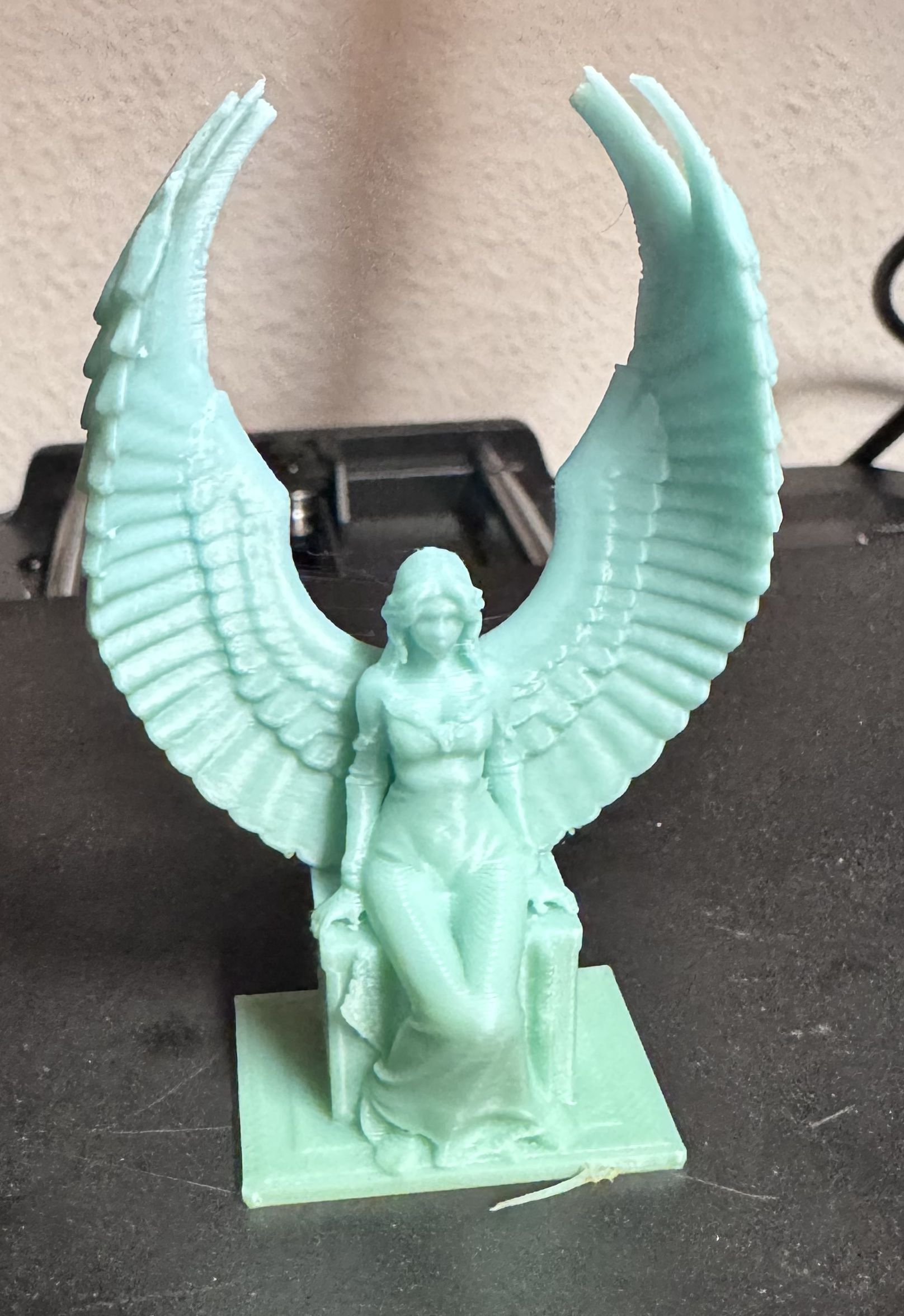Seated Angel Statue