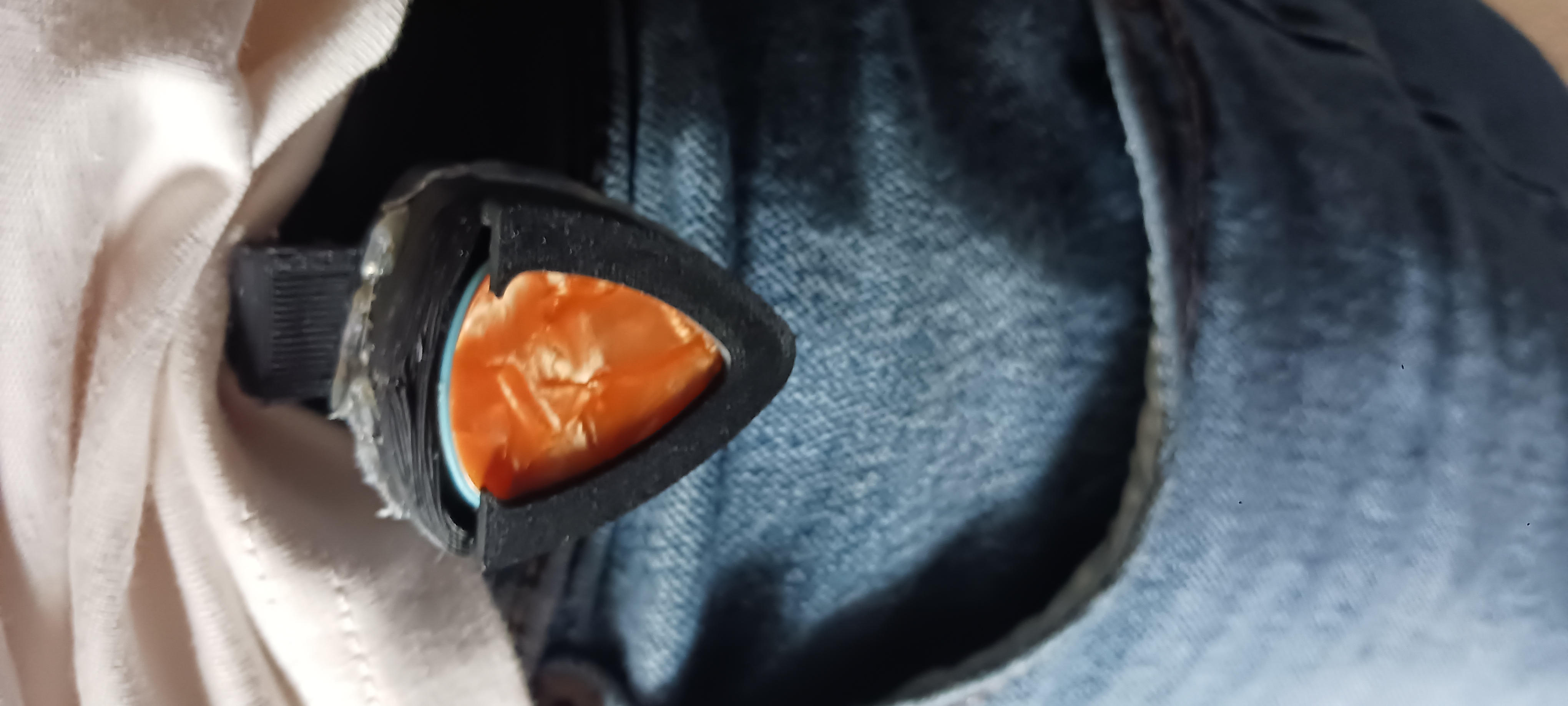 Guitar pick storage belt clip or keychain loop..