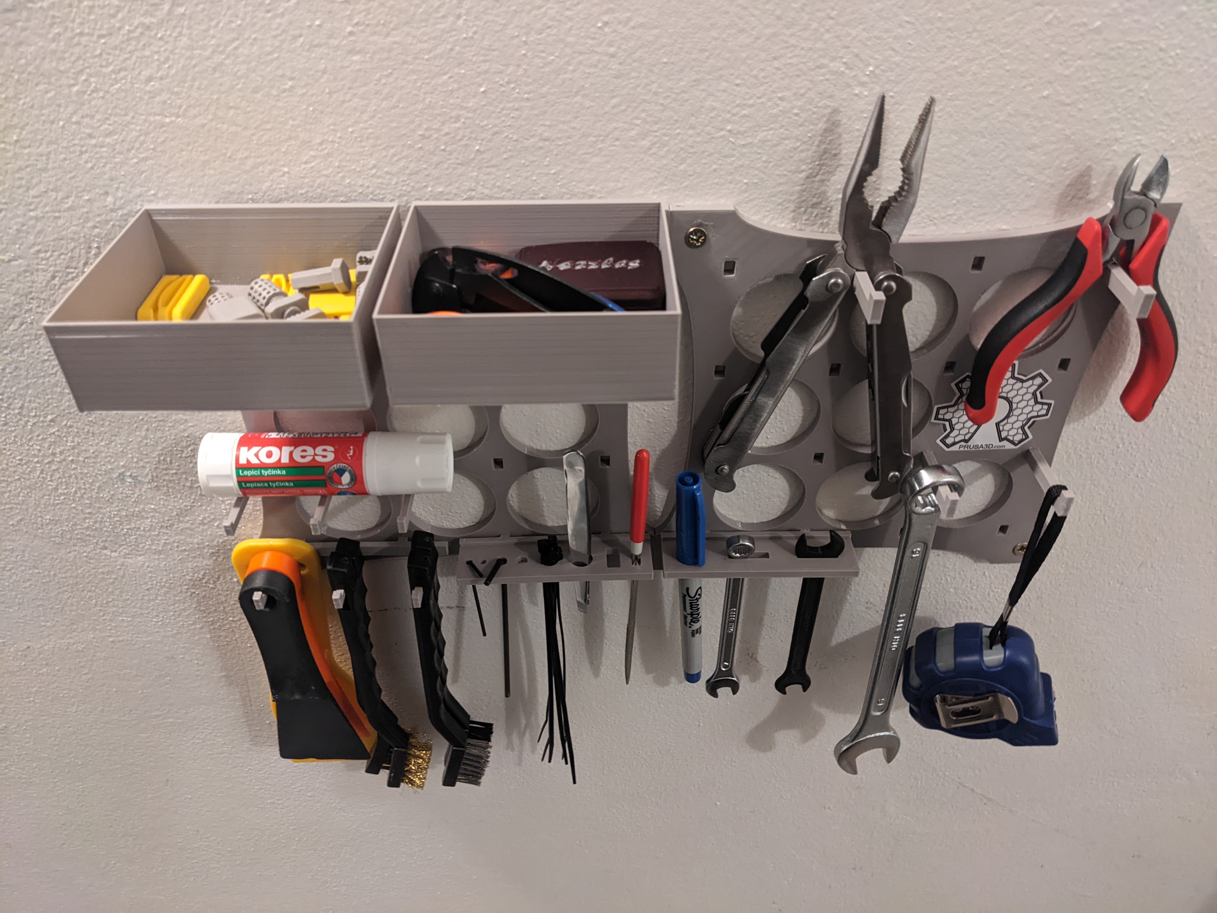 Modular wall-mounted organizer