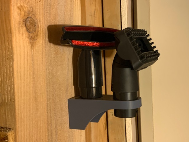 Wall bracket for vacuum attachments.