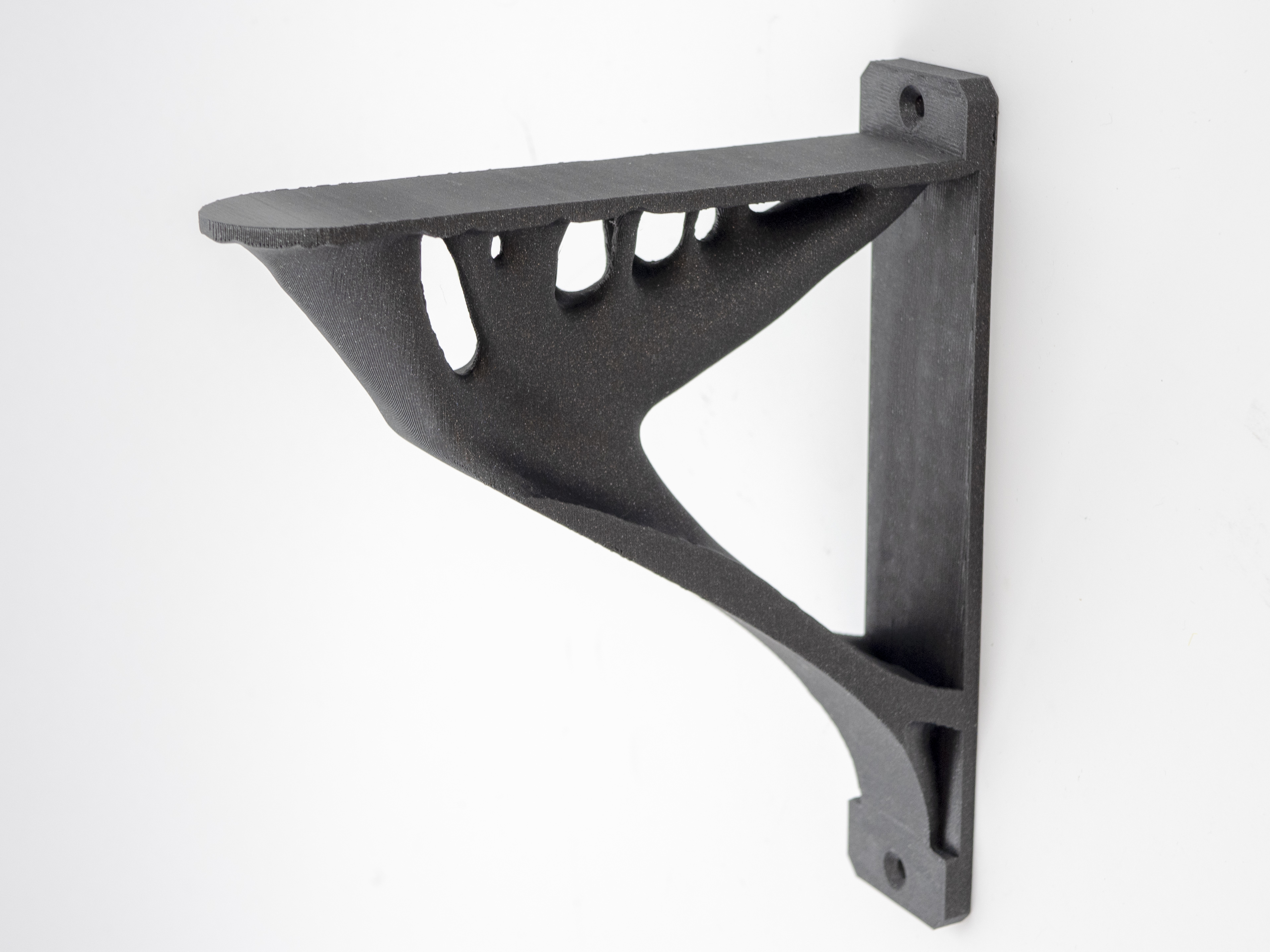 Smoothed topology optimized shelf bracket - Flat & thicker back, smoothed body