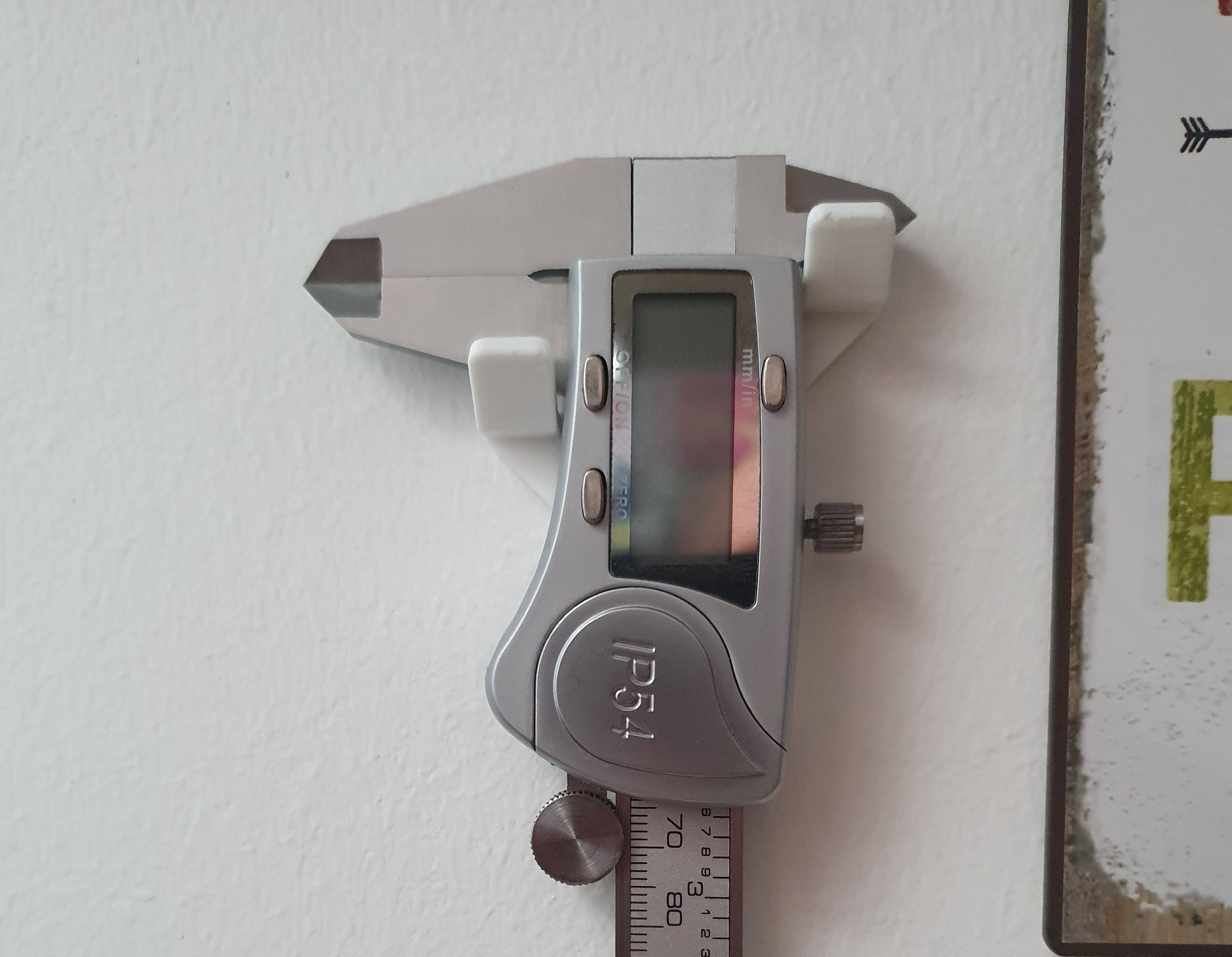 Caliper wall mount