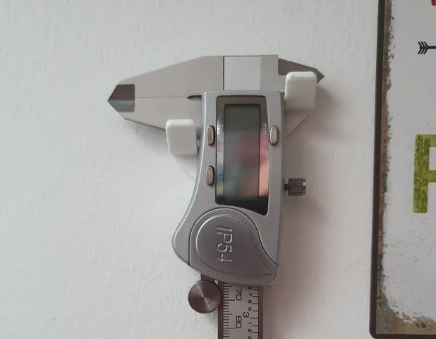Caliper wall mount