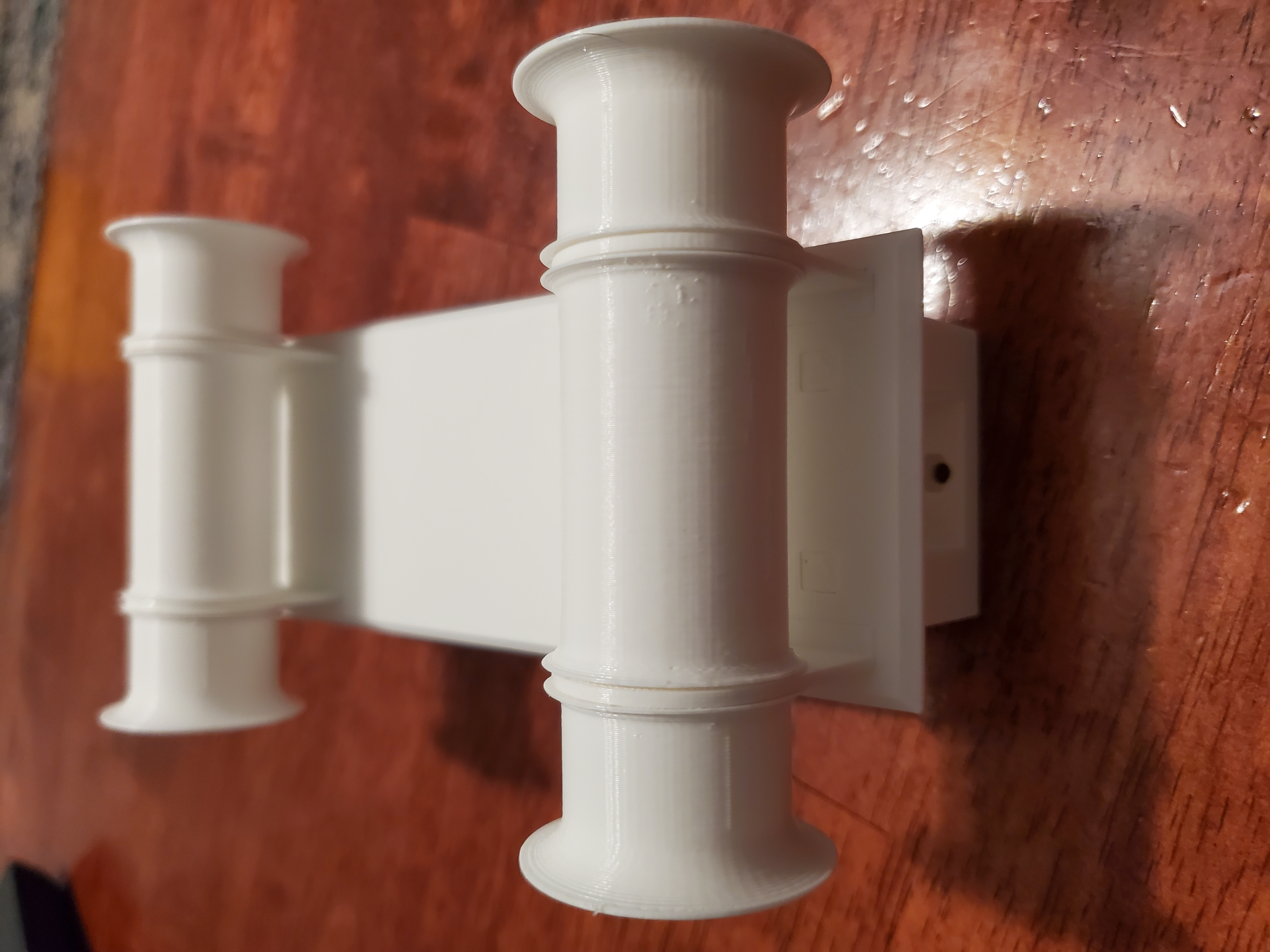 Minimal width universal spool holder for drybox
