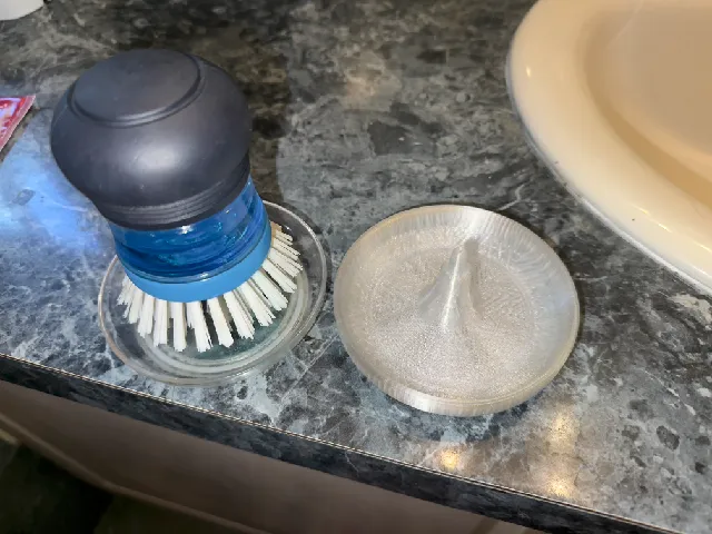 OXO palm brush holder