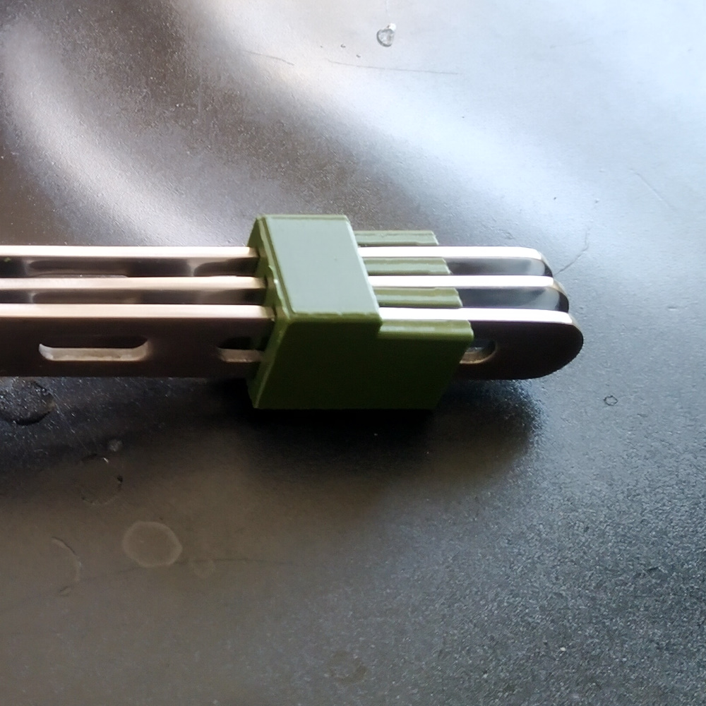 Holder clip for field cutlery