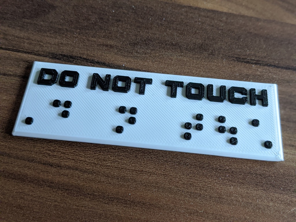 Braille " Do not touch "