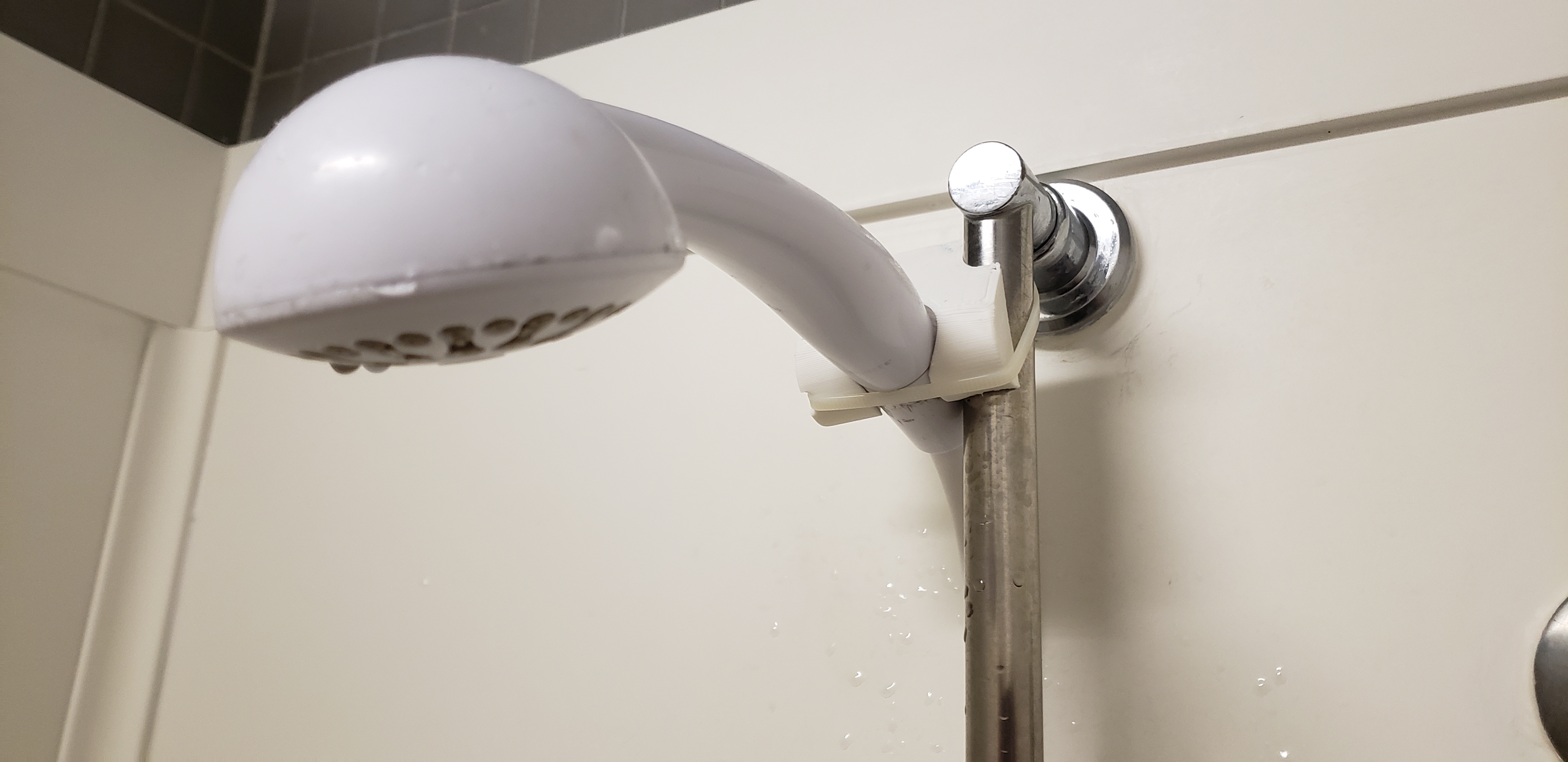 Shower hand-held holder: simple and quick fix