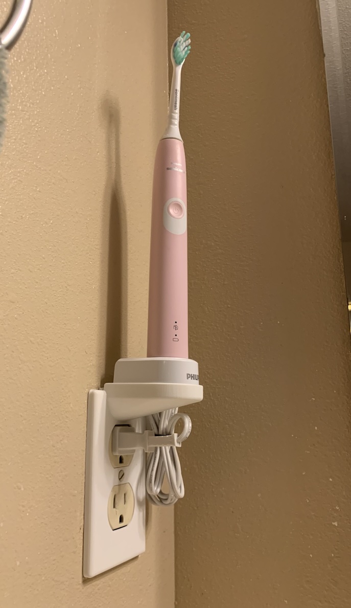 Sonicare toothbrush outlet cover holder