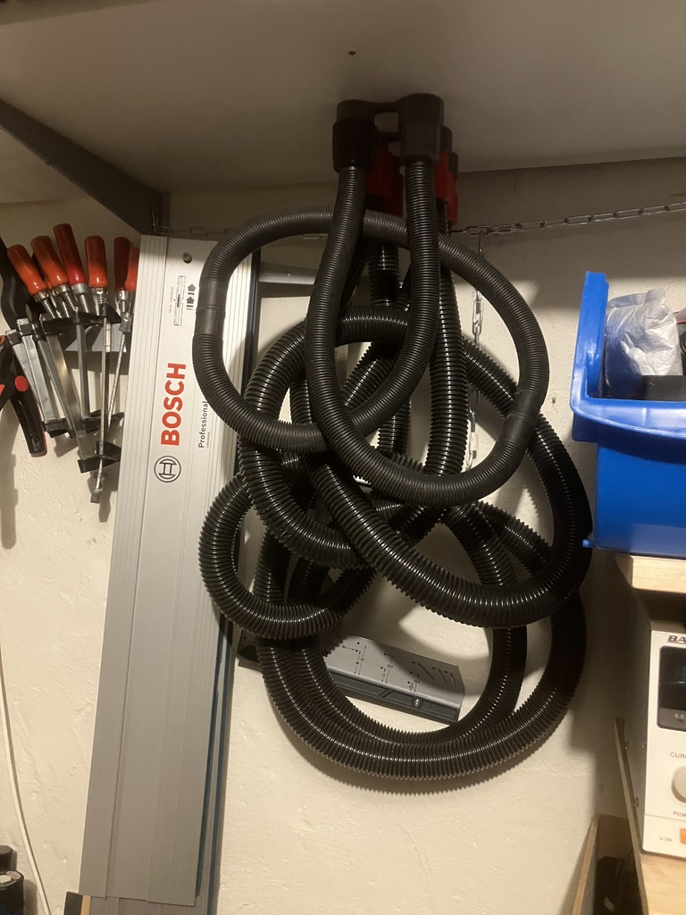osVAC hose storage solution, shelf mount