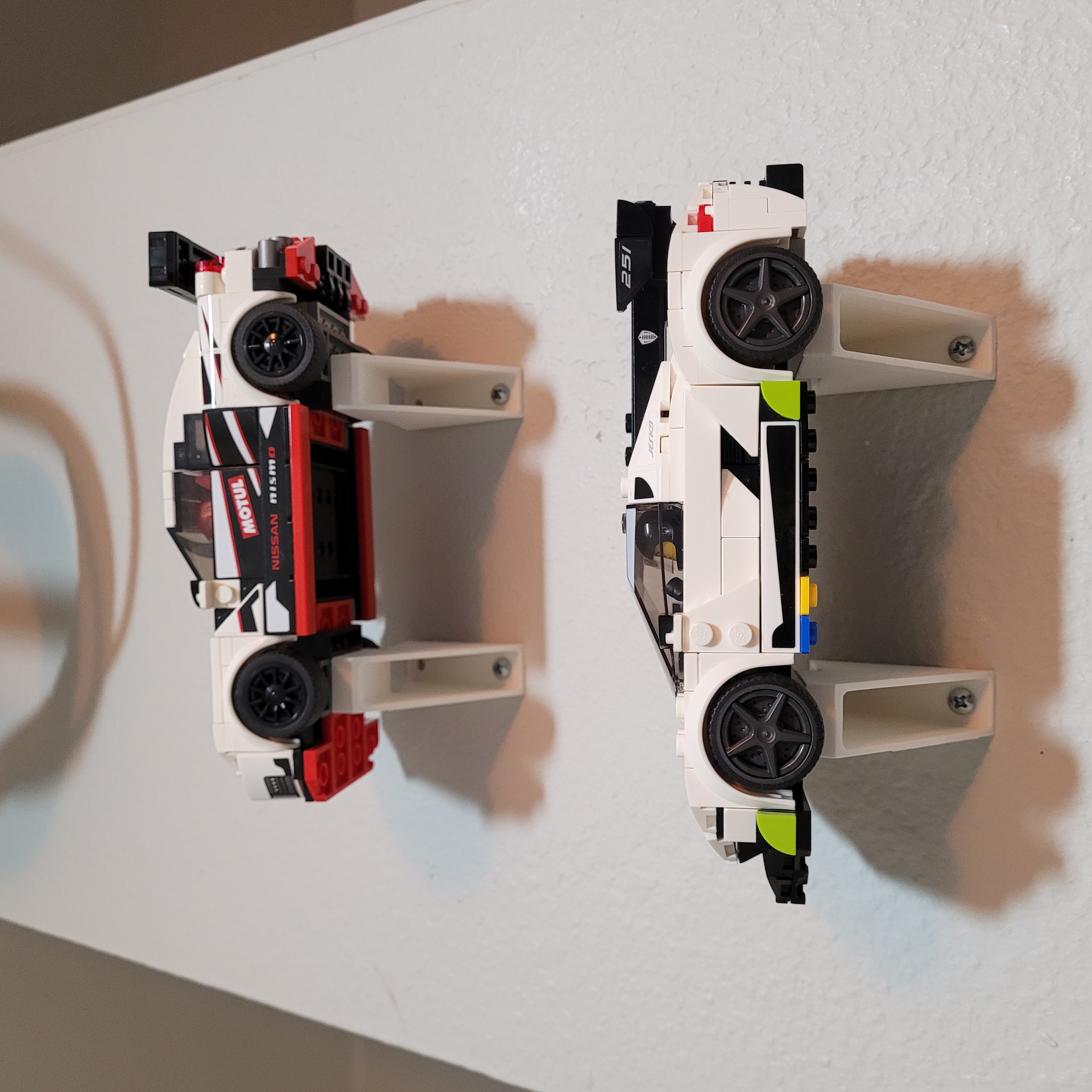 Wall mount compatible with LEGO(r) car models (tilted for viewing), with proper stud sizes that fit snugly