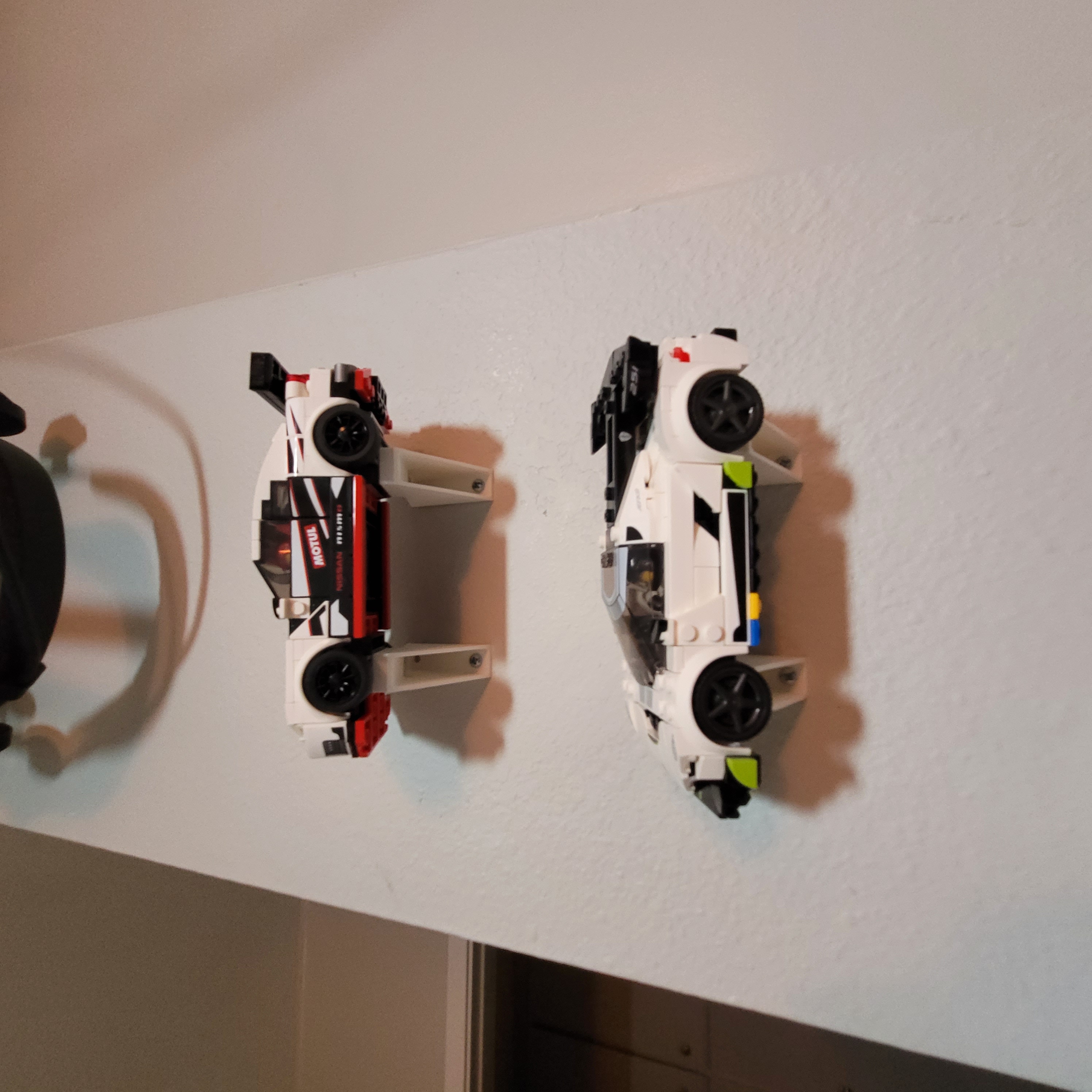 Wall mount compatible with LEGO® car models (tilted for viewing), with ...