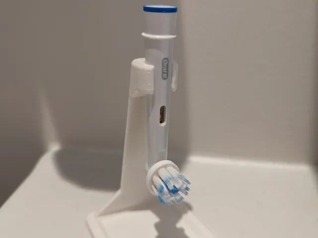 Oral b head stand with dripping tray.