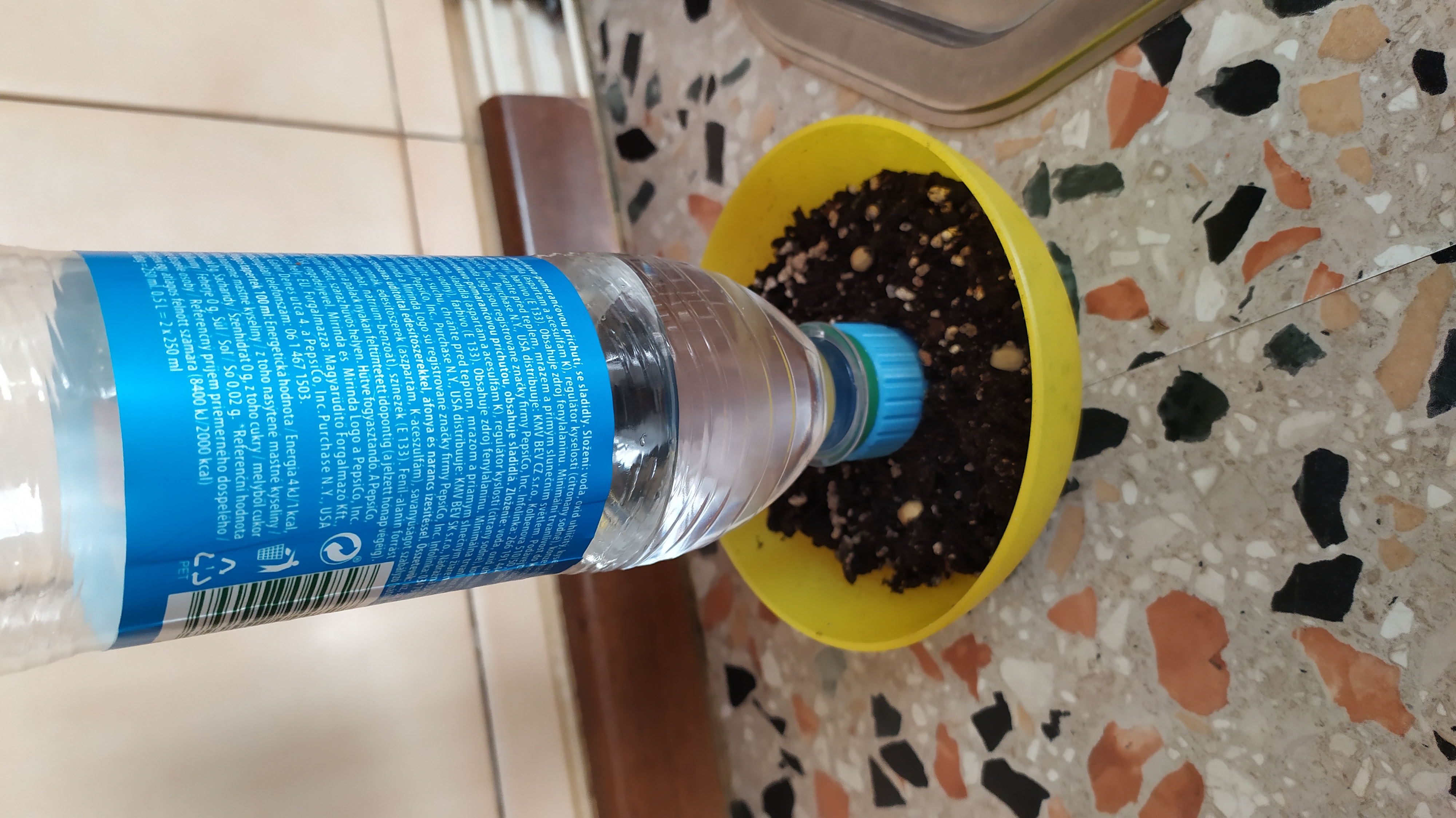 Self watering pet bottle