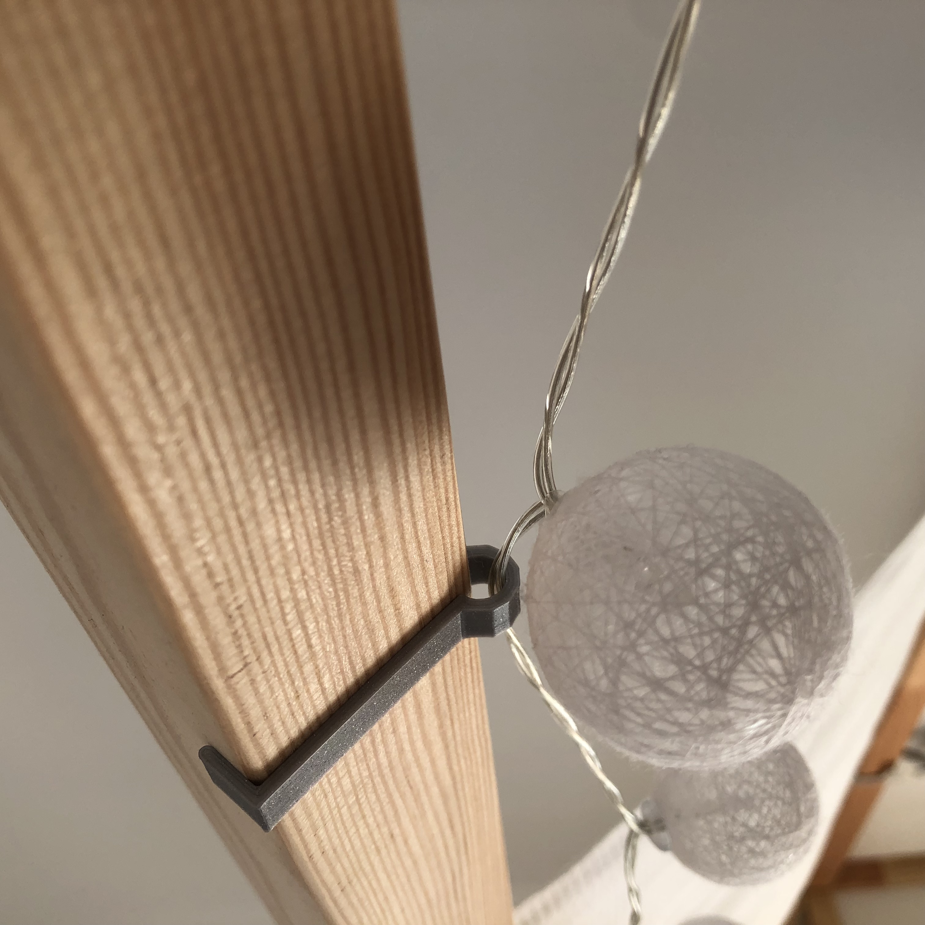 lazy fairy lights holder for IKEA Kura Bed