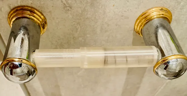 Toilet Roll Holder Spool using Spring Insert