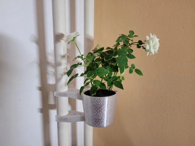 Flower pot holder on radiator rod