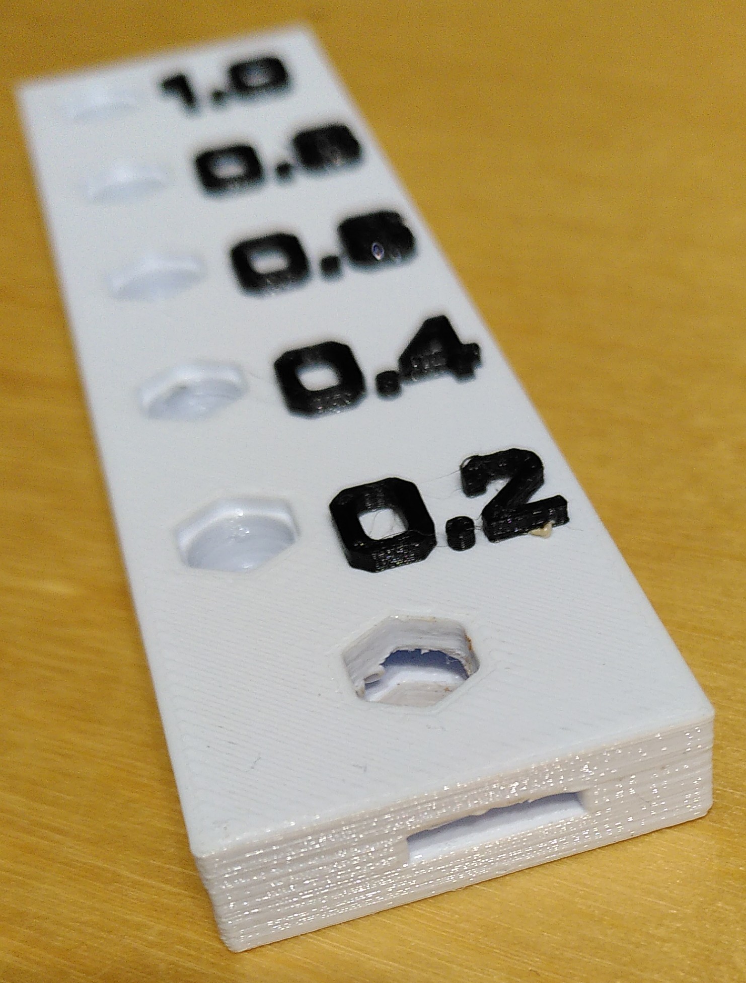 Customizable nozzle holder with two tool sockets