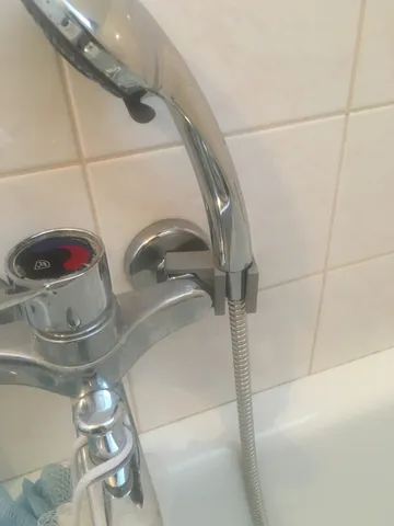 Držák hlavice sprchy verze 1,2