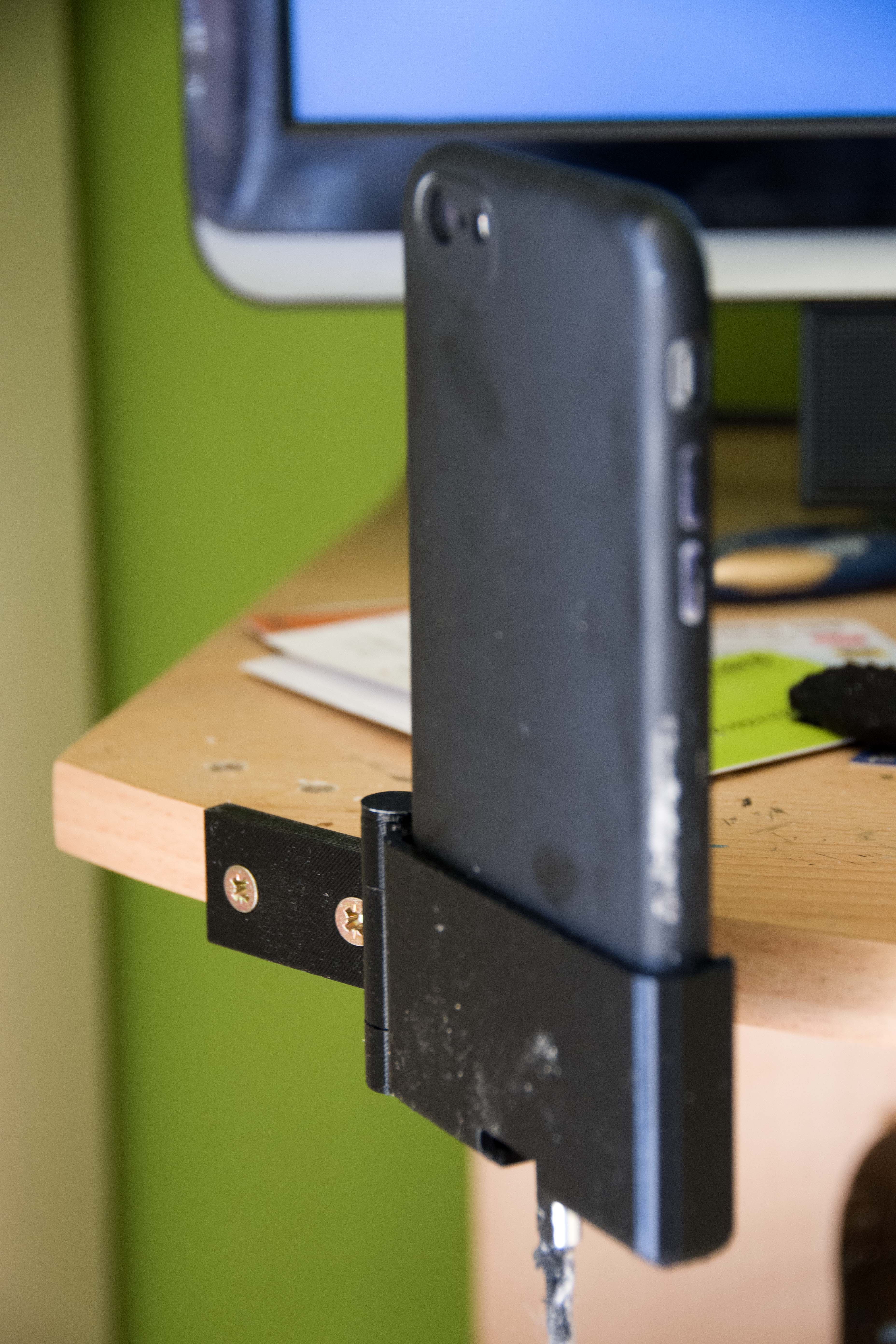 Swinging Desk Phone Holder with Power Lead Access by paul020559