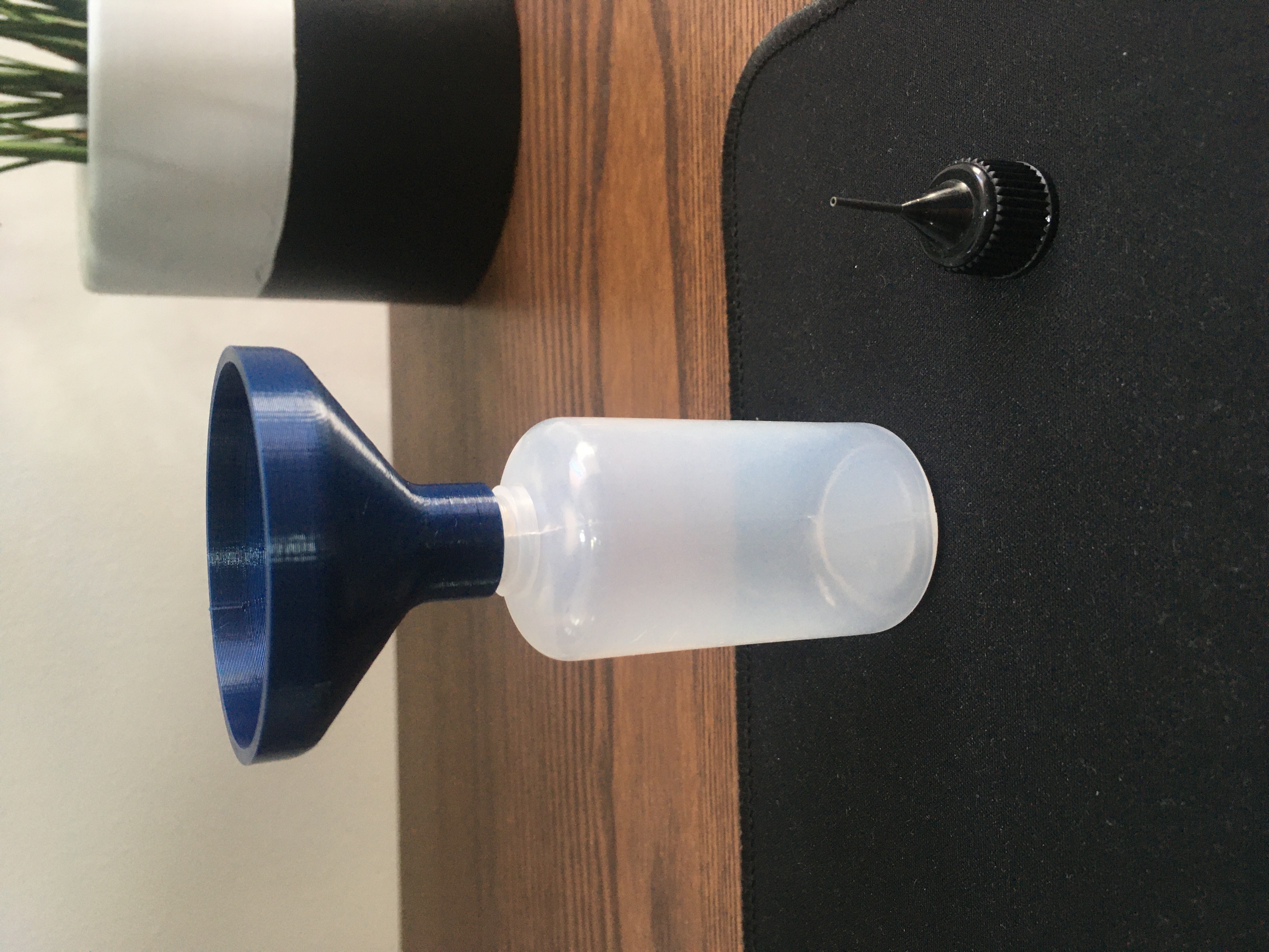 Funnel for small needle tip bottle