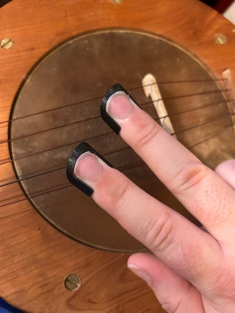 Nail Picks - Fingerpicks for people who love finger picking but hate fingerpicks