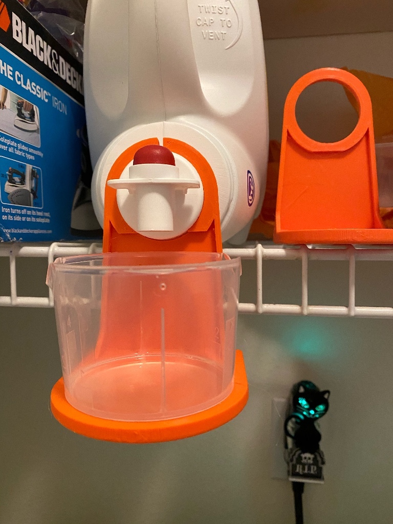 Laundry detergent measure cup hanging shelf