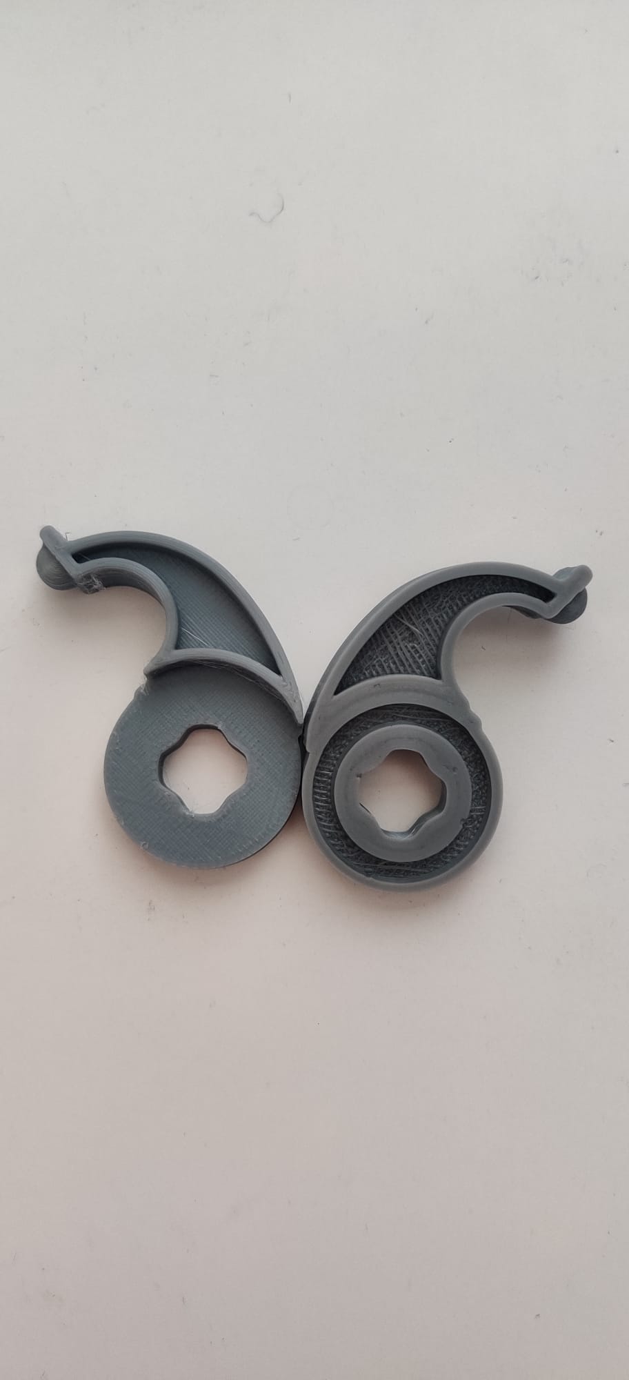 Vihtan door handle return mechanism