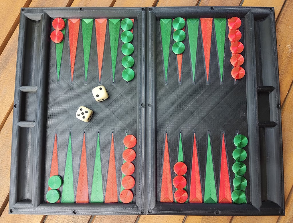 Backgammon with magnetic hinges
