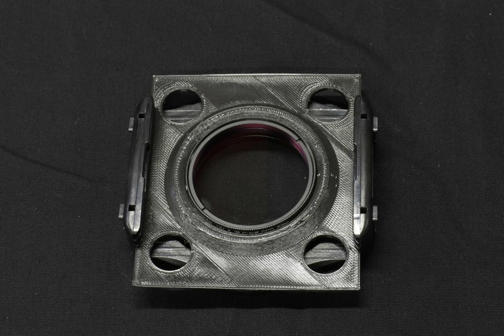 An adapter for a 2 inch round filter into a Cokin P  series mount