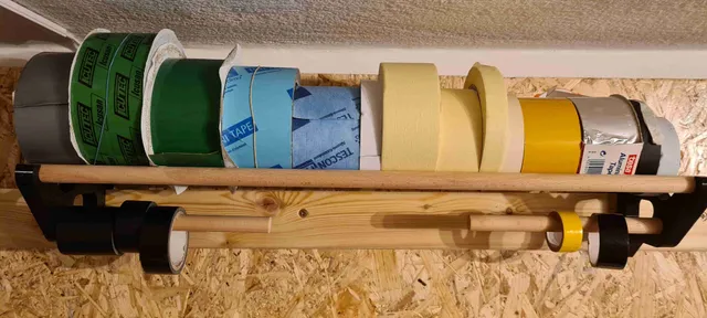 Shelf for adhesive tapes