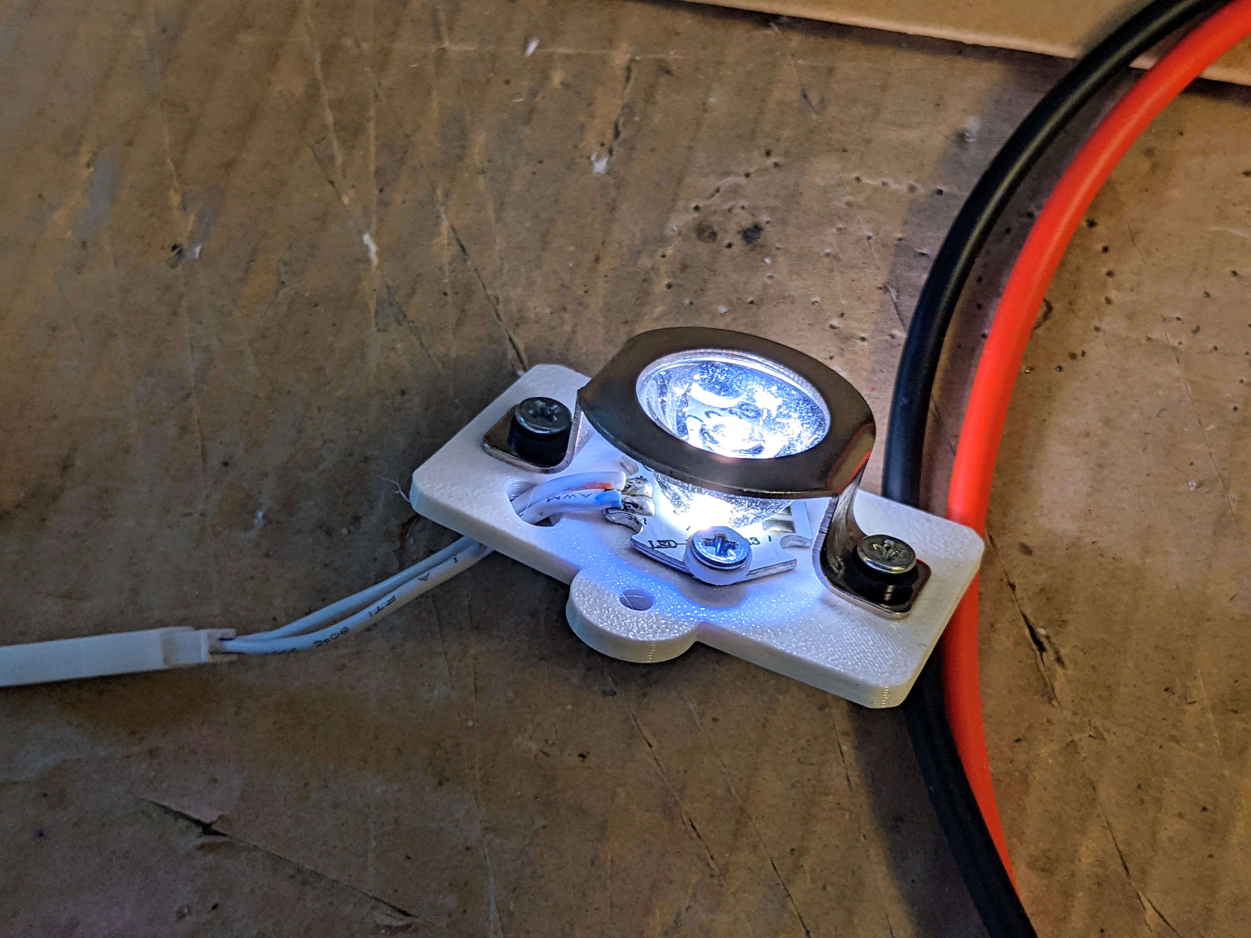 Mounting bracket for a bright LED