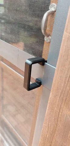 Clip on handle for mesh door.