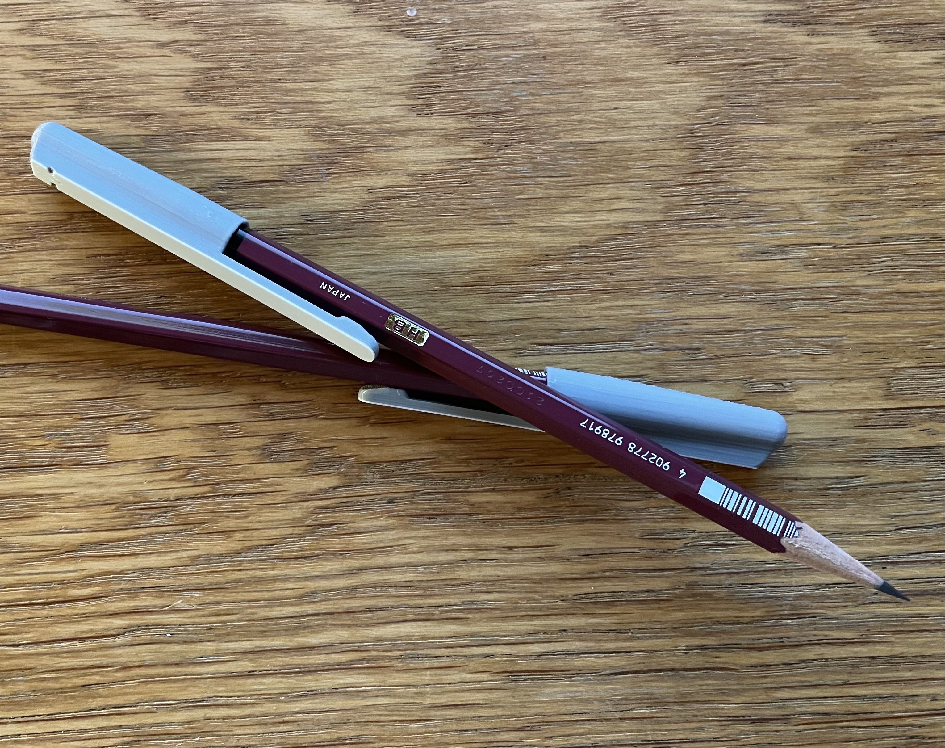 Pencil cap with clip and hardness indicator