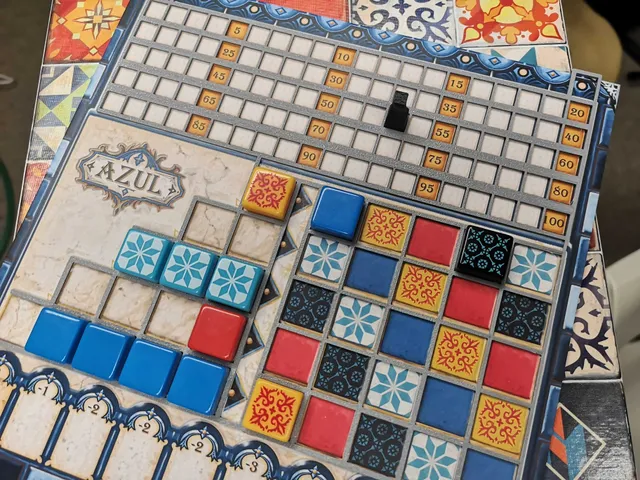 Azul boardgame board overlay tile slots and score keeping peg