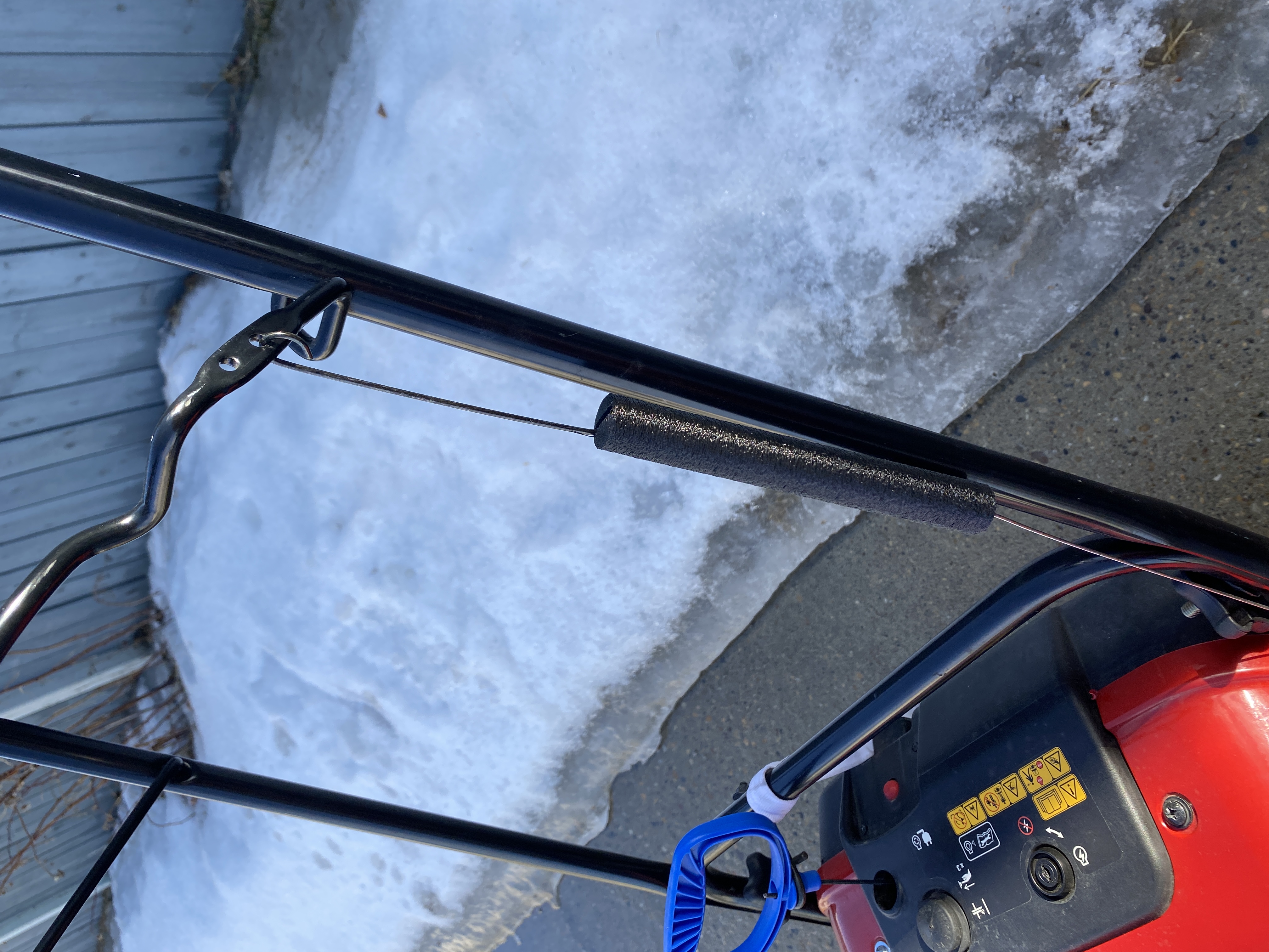 Cable protector for Toro PowerClear 721E snowblower