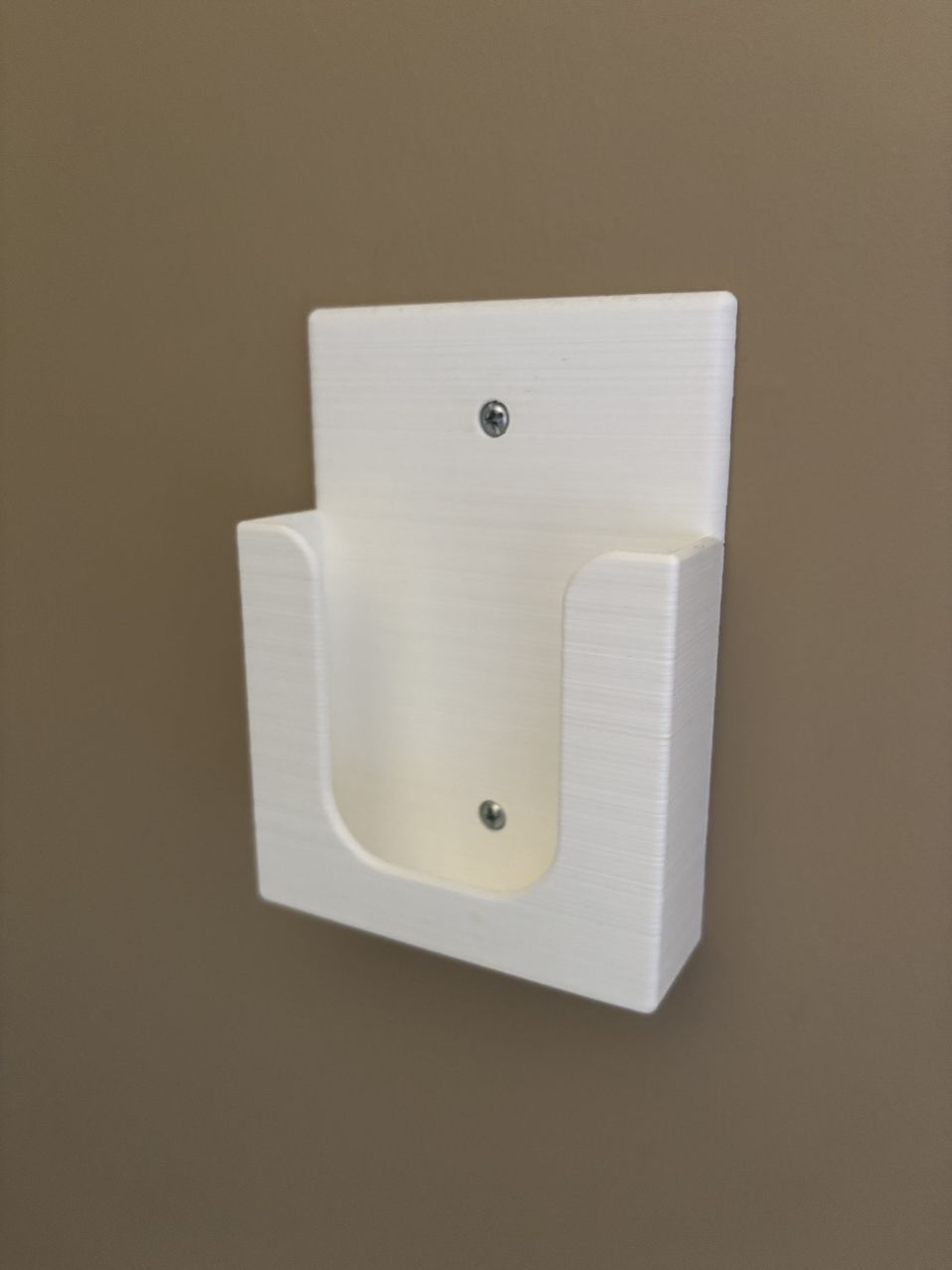 Cell phone wall mount