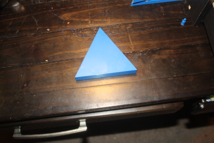 Lid for Triangular Peg Puzzle