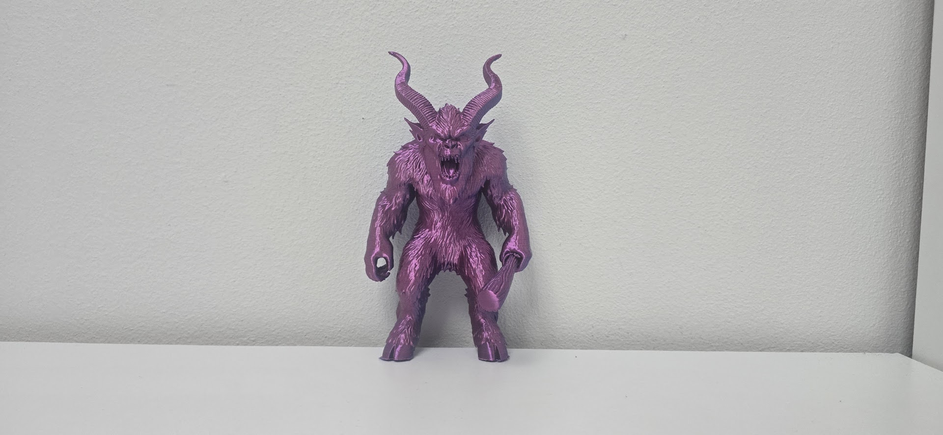 Purple Furry Winter Demon Christmas Figurine