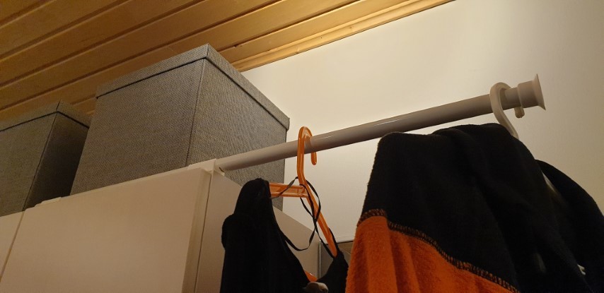 Coat hanger rack on a cubboard