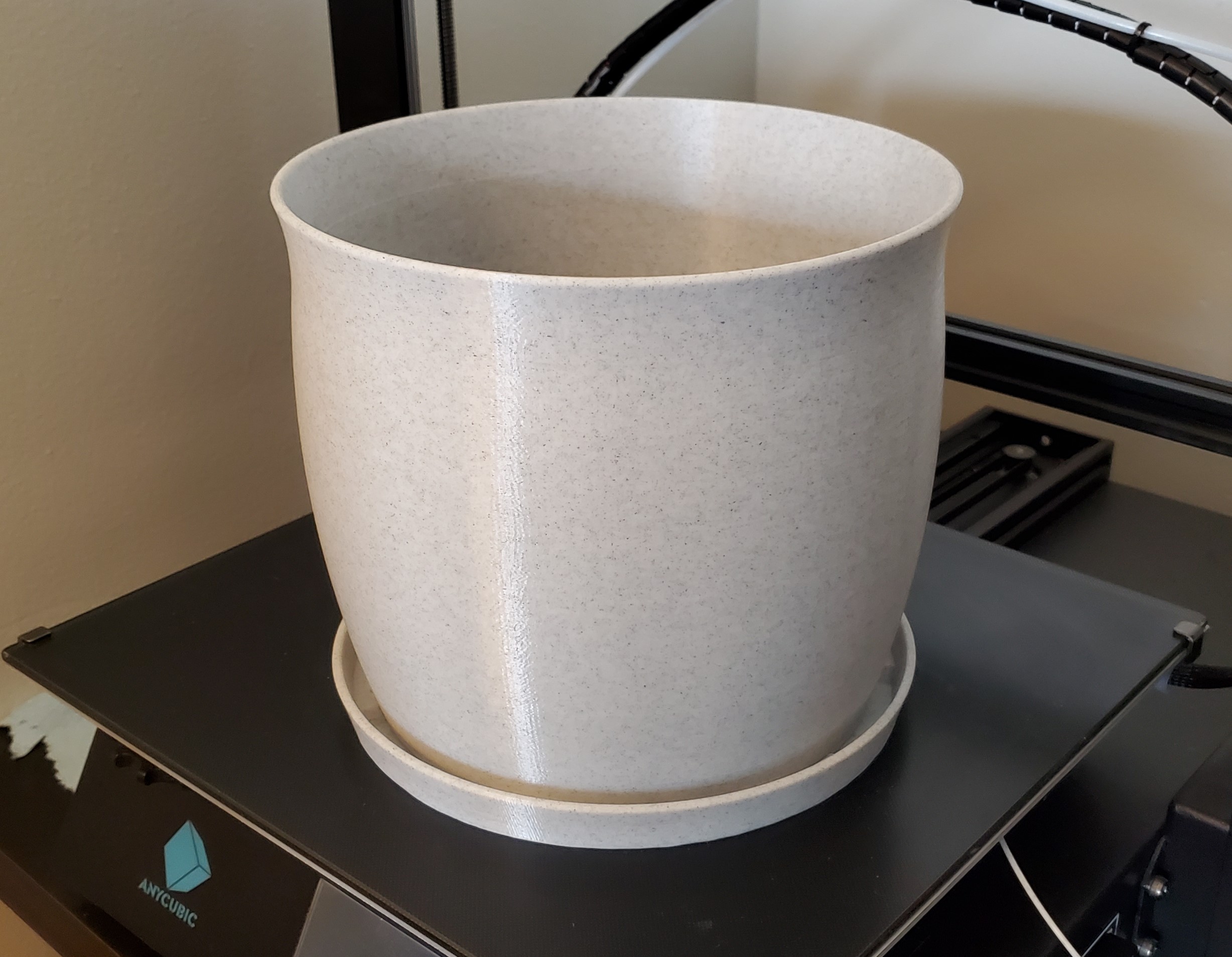 Plant pot and saucer in cauldron shape