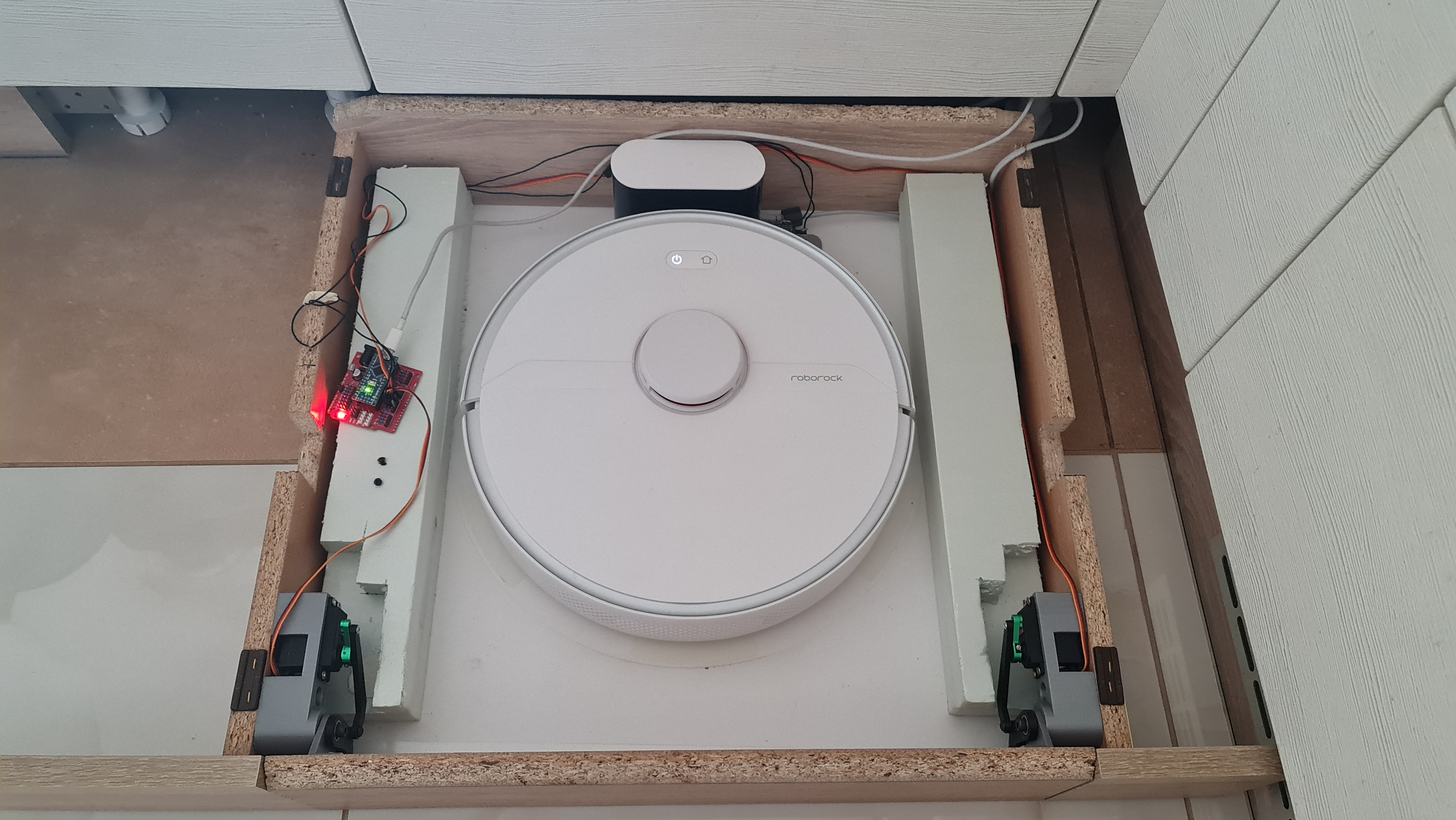 Robotic vacuum garage door v2.0
