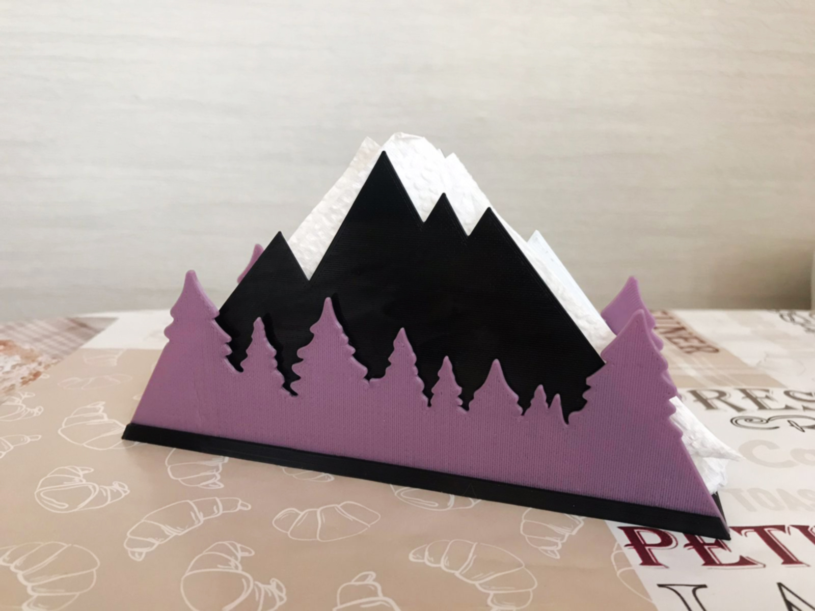 Napkin holder. The mountains