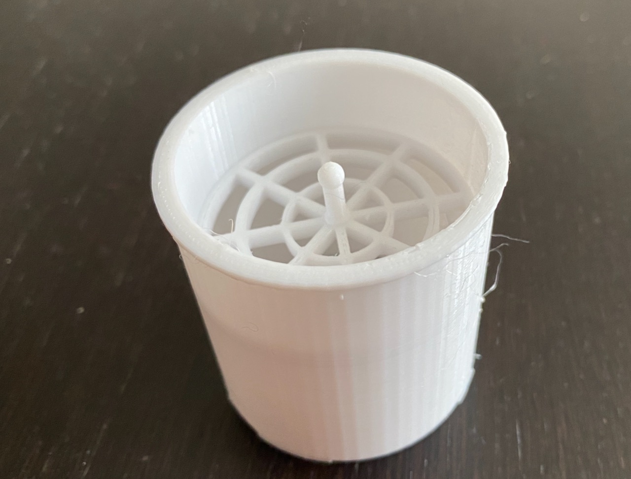 Floor level shower sieve