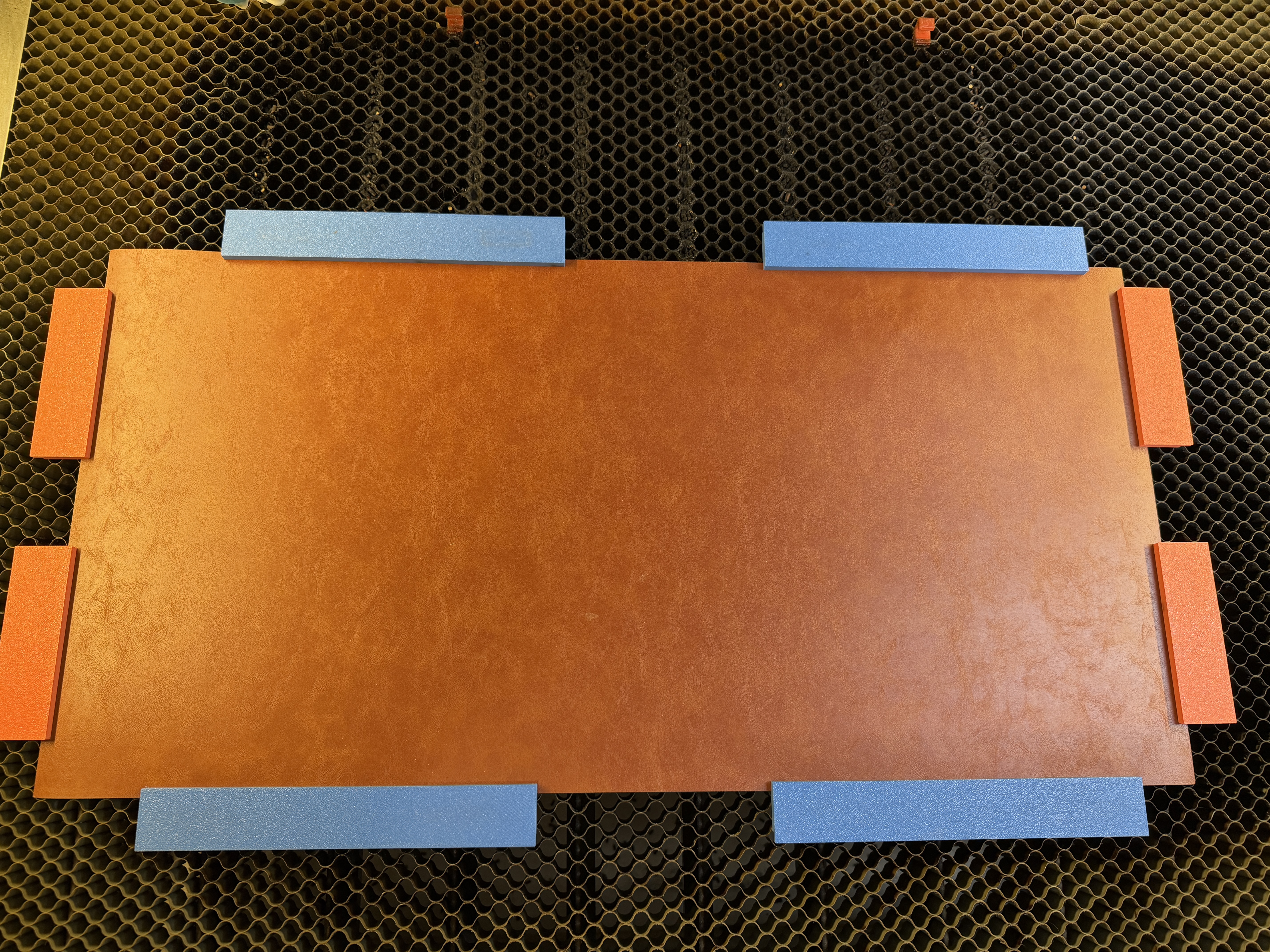 Magnet bars for laser beds